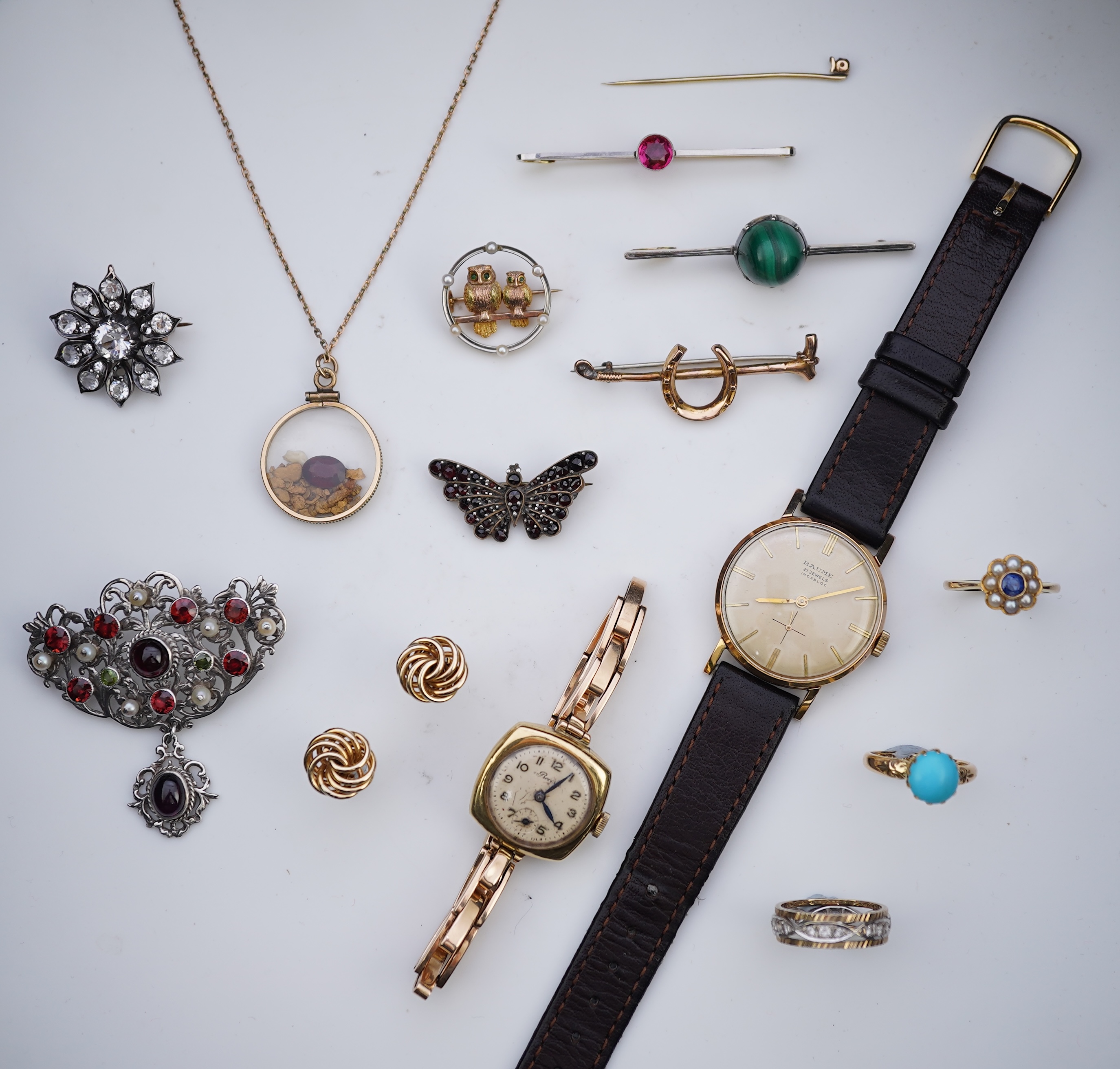 A group of jewellery and two watches